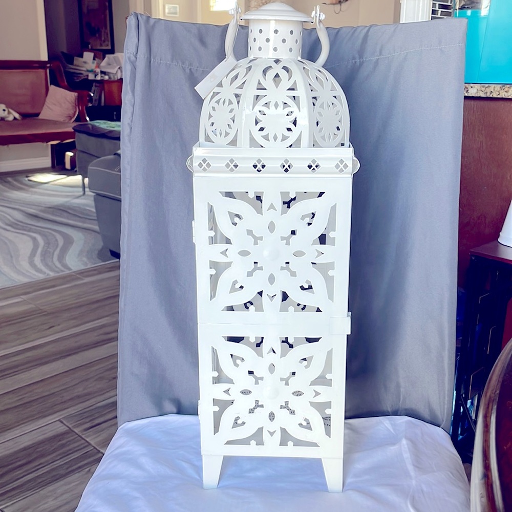 Candle lantern, amazing patterns, size: 25 1/2”high, 6 1/2” width. All white